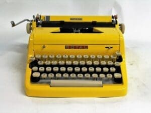 Royal Quiet De Luxe Typewriter in Yellow