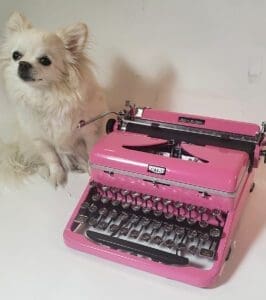 Dog With Royal Quiet De Luxe Typewriter in V.Pink from the 1940's