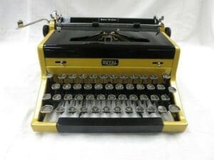 Royal Quiet De Luxe Typewriter in Gold and Black