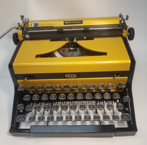 Royal Quiet De Luxe Typewriter in Gold and Black
