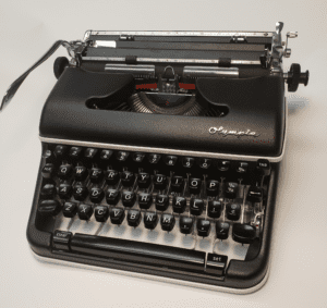 Olympia SM3-SM4 Typewriter in Texture Black with Silver Stripe
