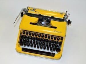 Olympia SM3-SM4 Typewriter in Yellow