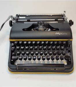 Olympia SM3-SM4 Typewriter in Flat Black with Gold Stripe