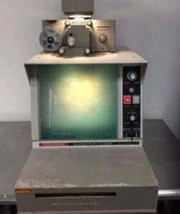 Old medical imaging device with monitor and camera.
